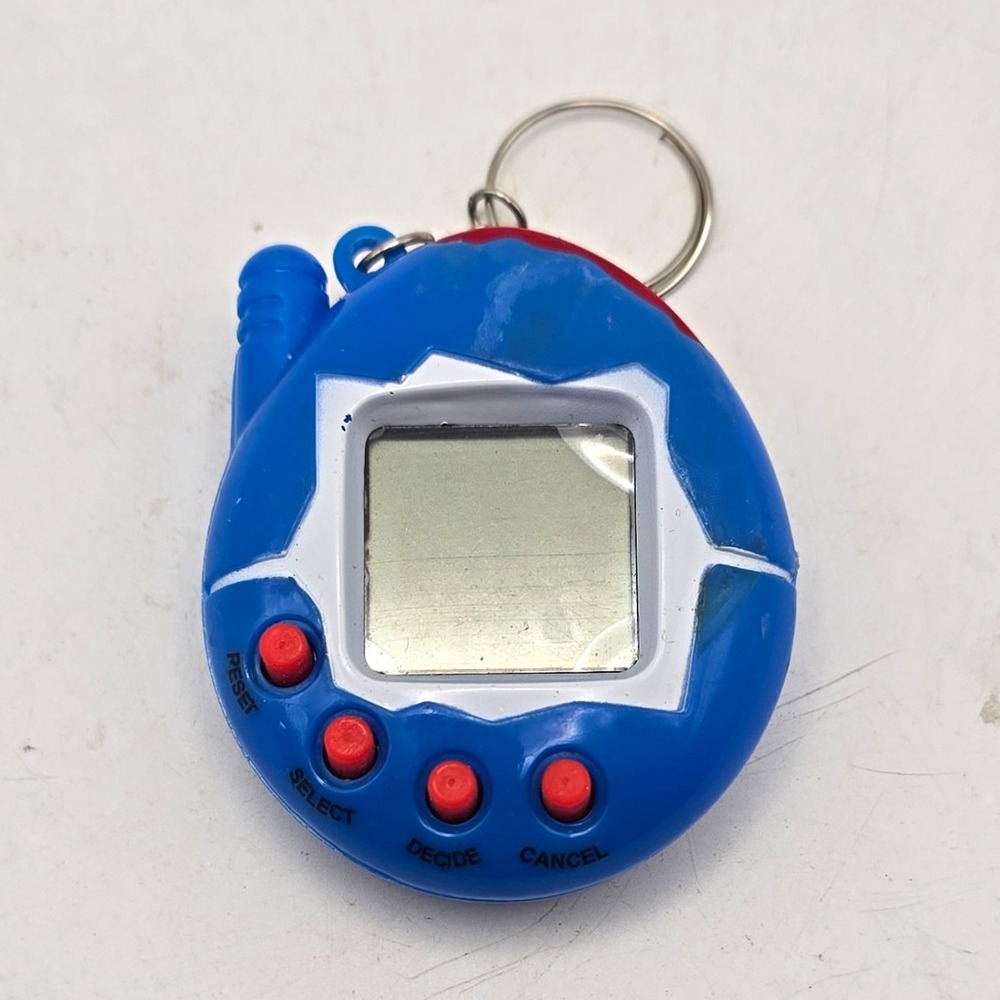 Blue Virtual Pet Electronic Keychain Toy Handheld Game, Tamagotchi UNTESTED